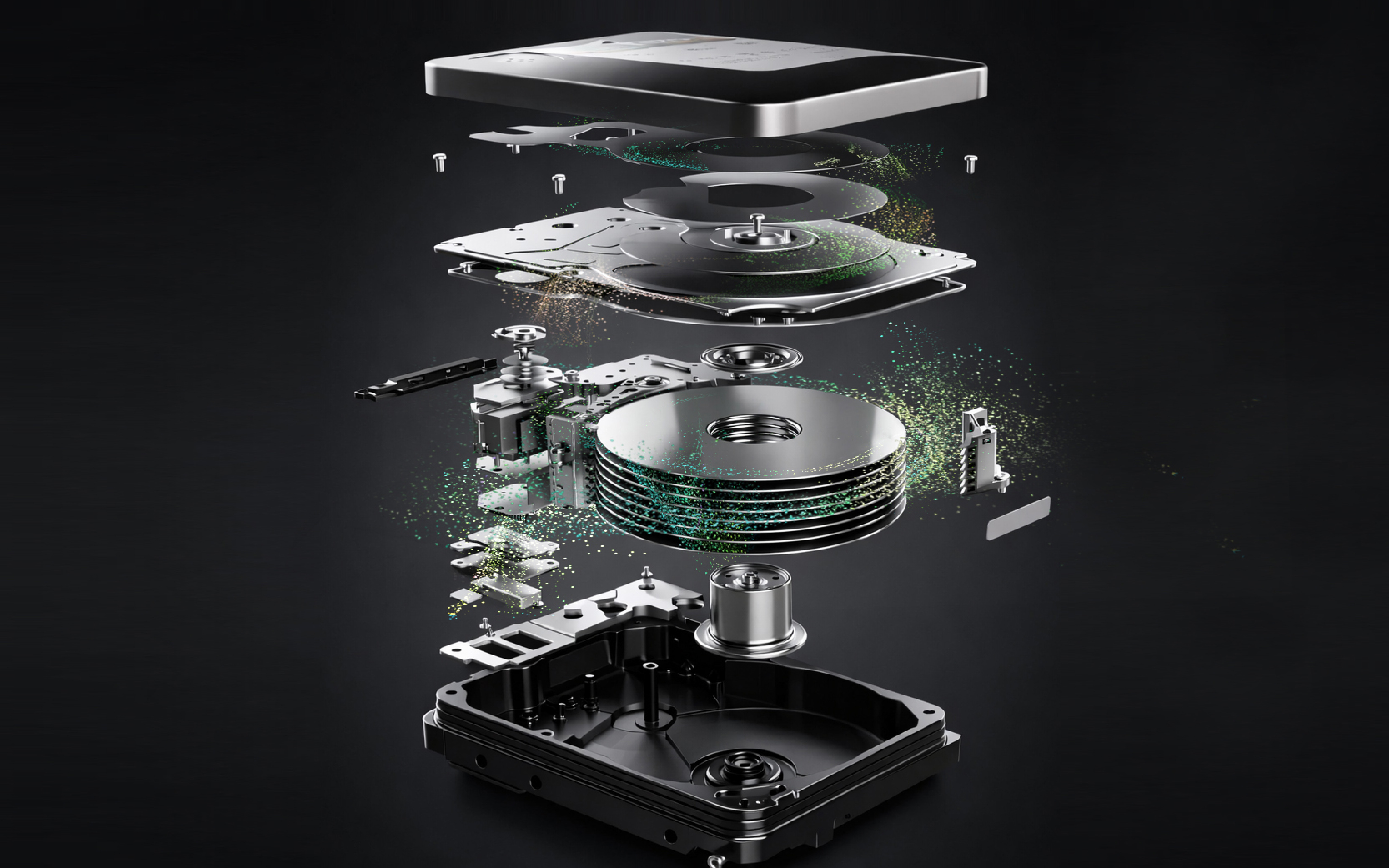 Exploded view of a hard disk drive showing separated cover, platters, actuator arm, and base with colored particle effects.