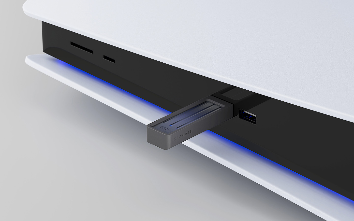 Ultra Compact SSD connected to a PlayStation system demonstrates its use with compatible gaming devices.