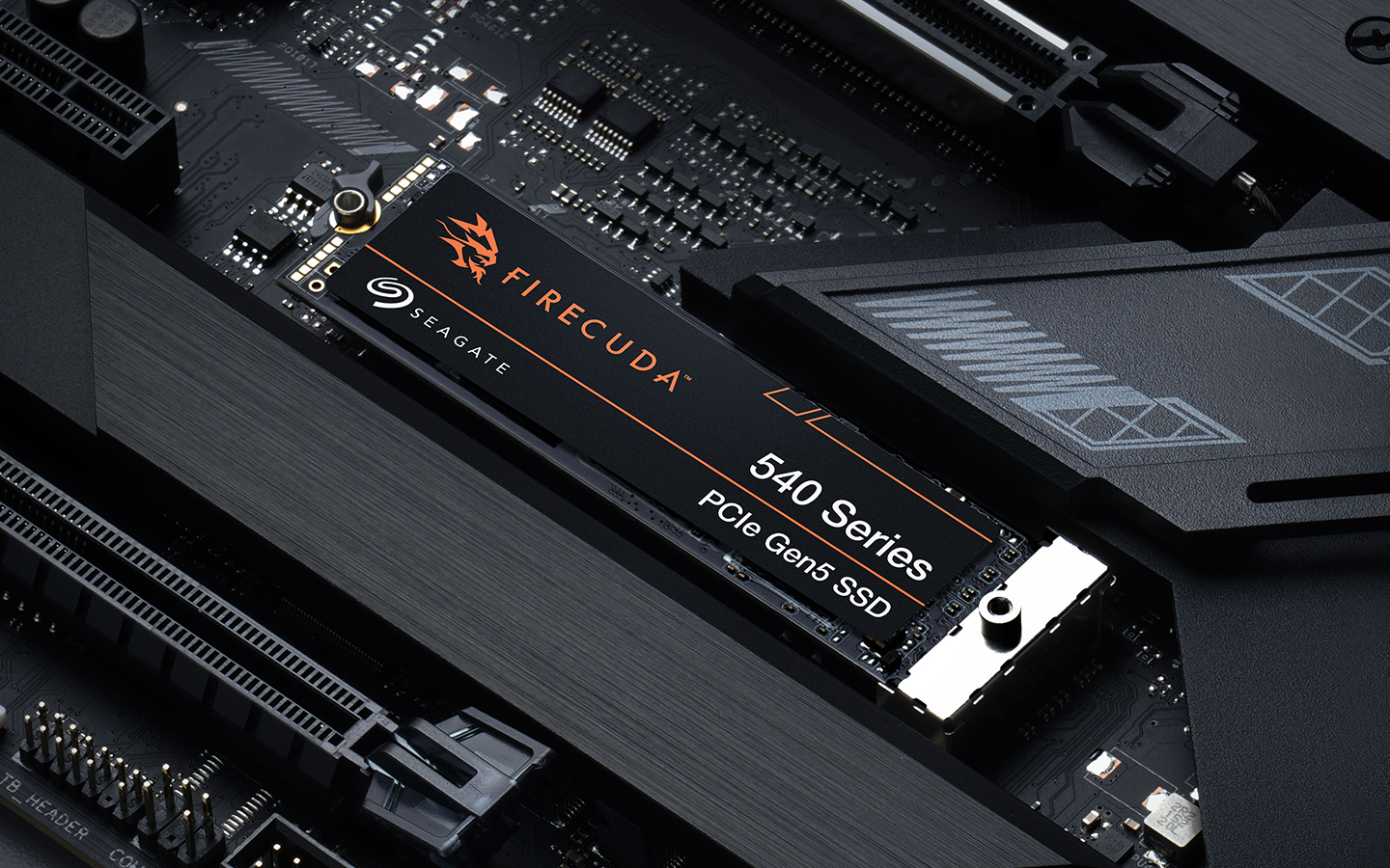 Up-close shot shows a FireCuda 540 Series PCIe Gen4 SSD added to a gaming system.