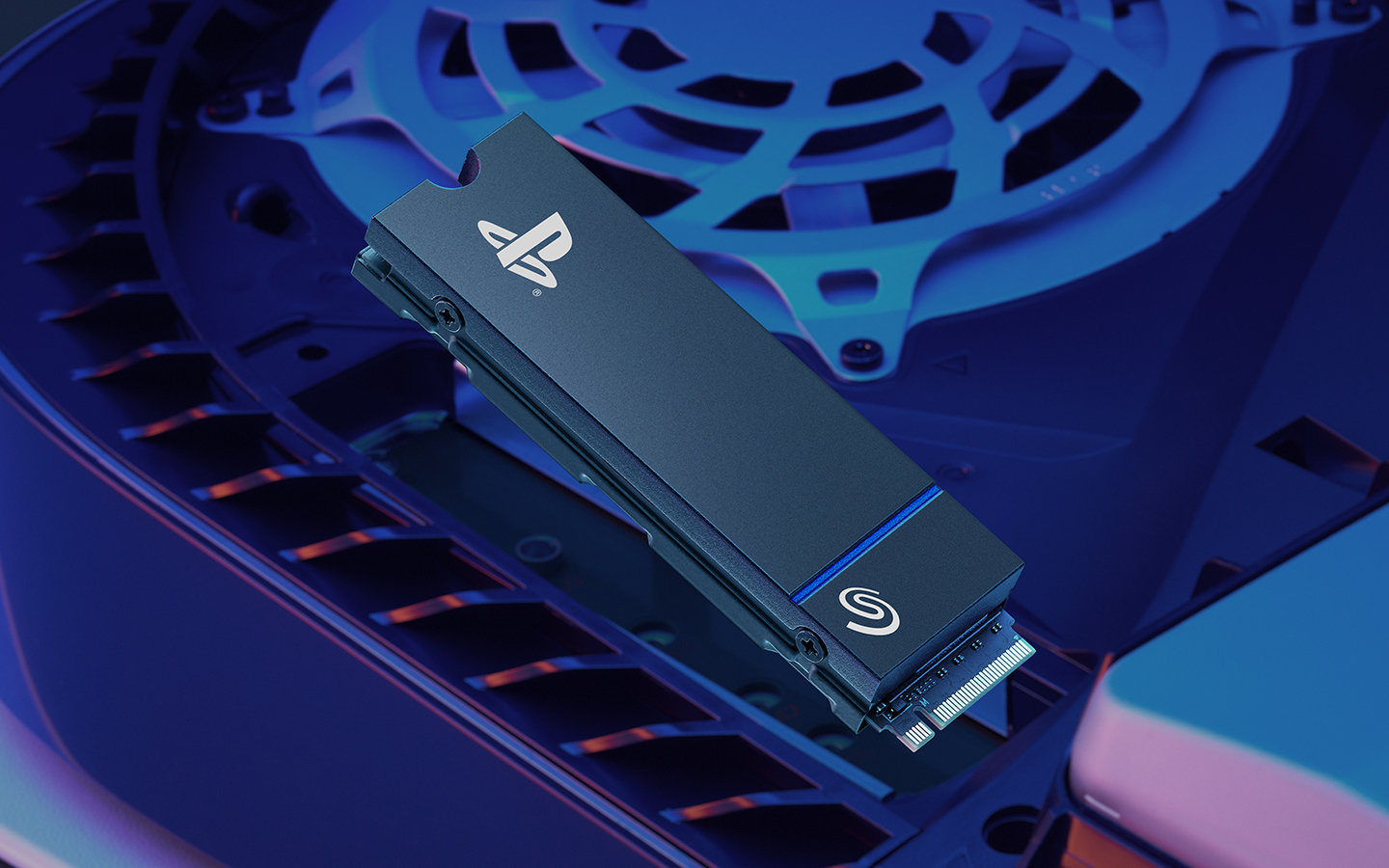 Close-up of a PlayStation-branded Seagate M.2 SSD installed inside a PlayStation 5 console.