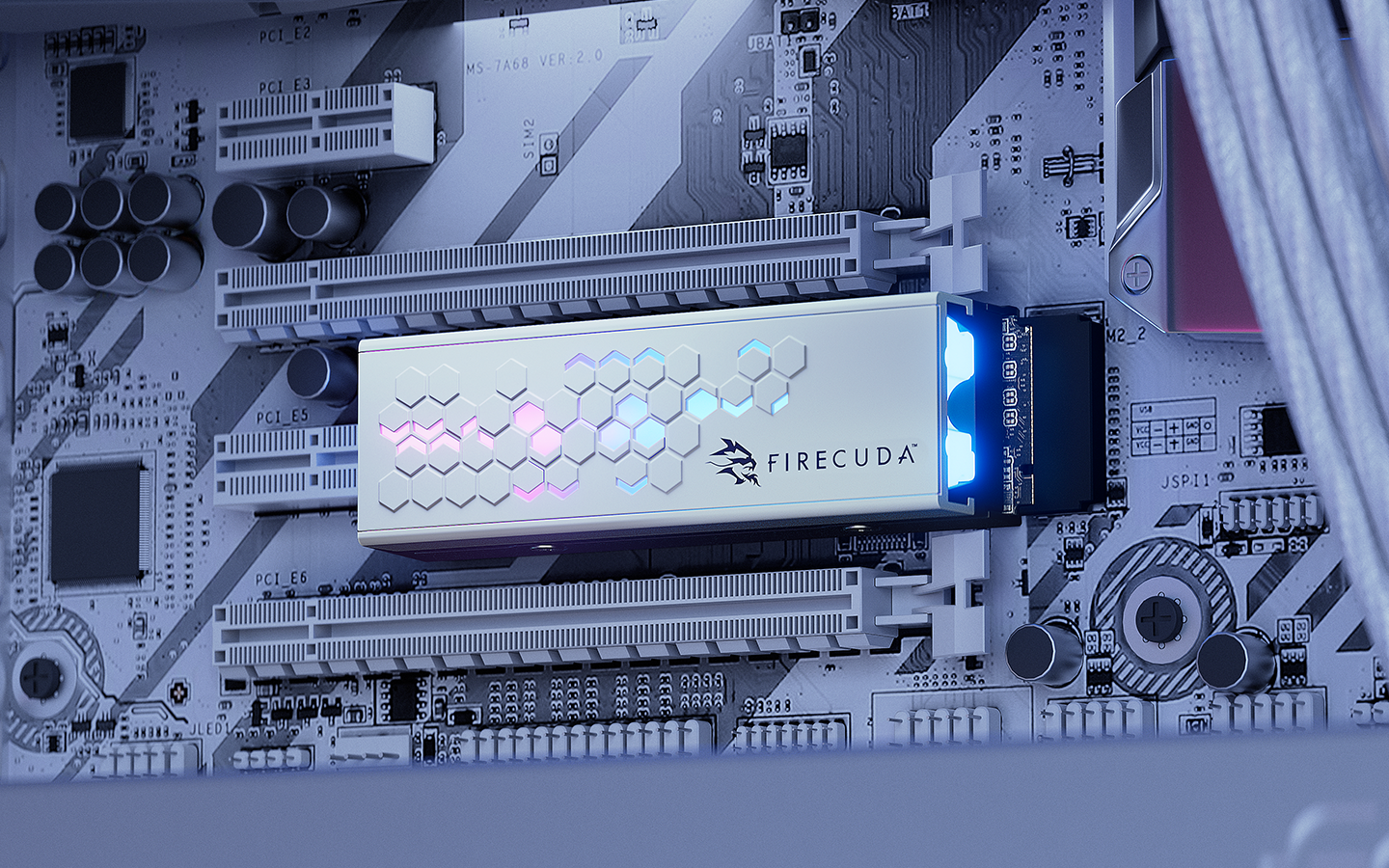 FireCuda silver M.2 NVMe SSD aligned above the M.2 slot on a motherboard, is ready for installation.