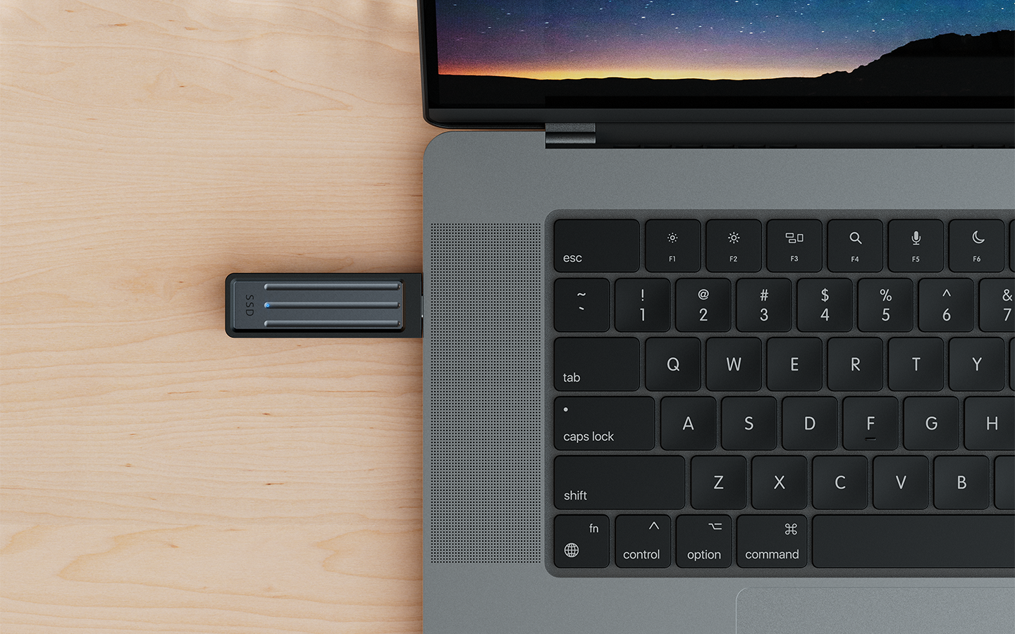 Laptop features a Seagate Ultra Compact external SSD plugged in via the USB-C port.