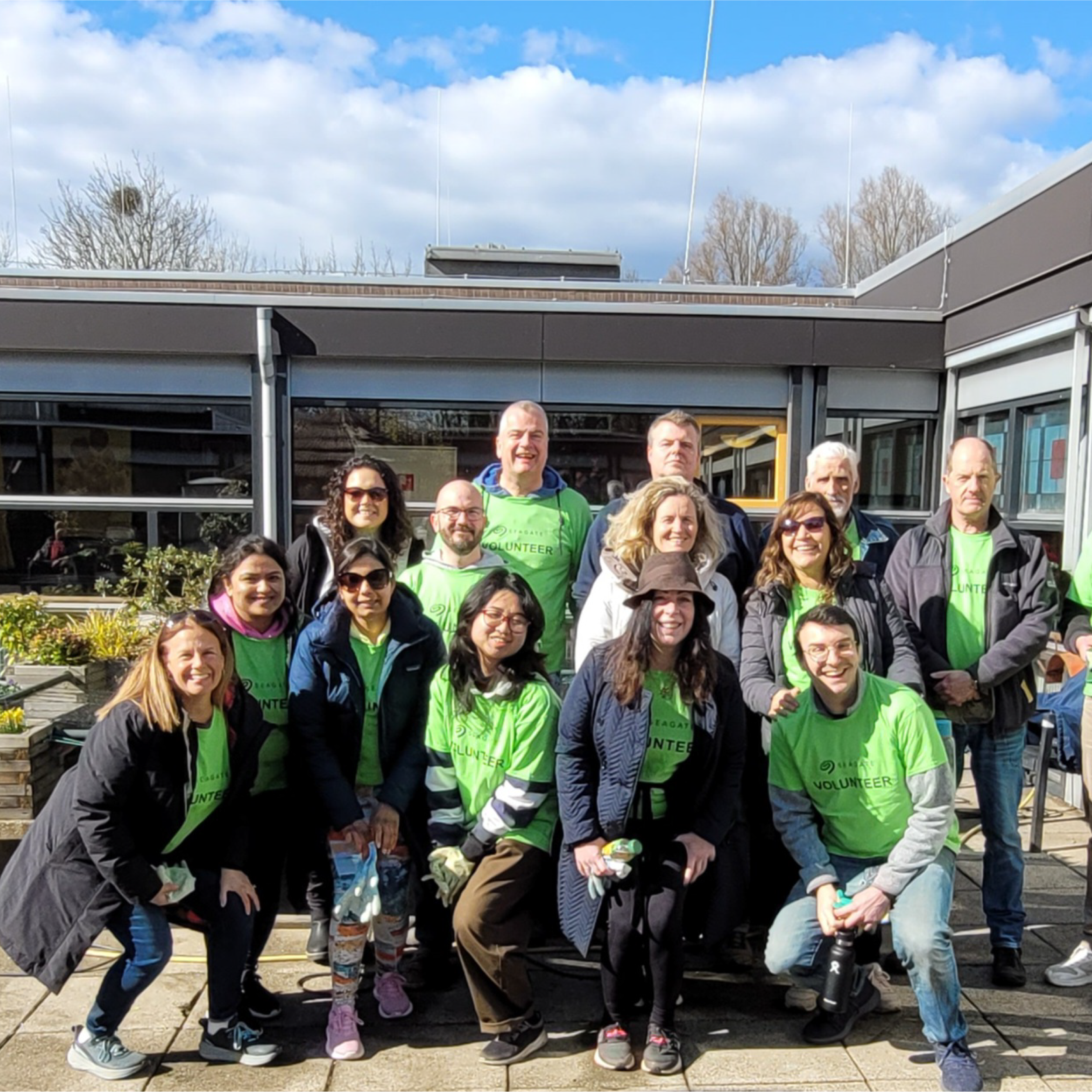 A group of Seagate employees outside taking a group photo.