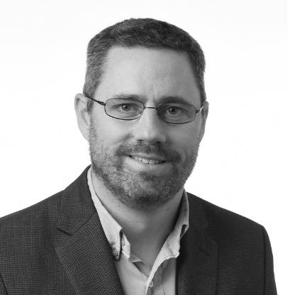 Black-and-white headshot of Colin Presly, Seagate vice President of Customer Engineering.